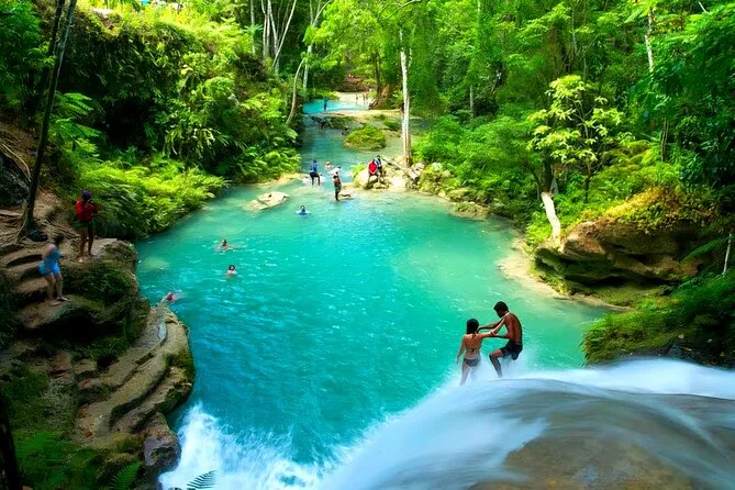 Turquoise Blue Hole limestone pools with rope swings in the Ocho Rios rainforest — the most popular excursion in Ocho Rios Jamaica
