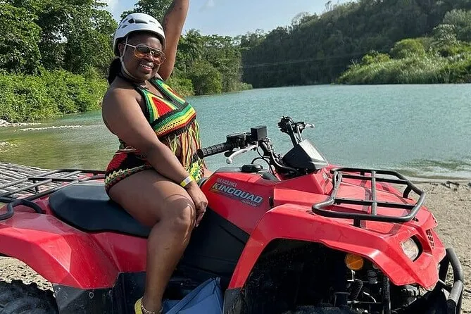 ATV riders on a jungle mountain trail above Runaway Bay on an adventure Ocho Rios excursion Jamaica